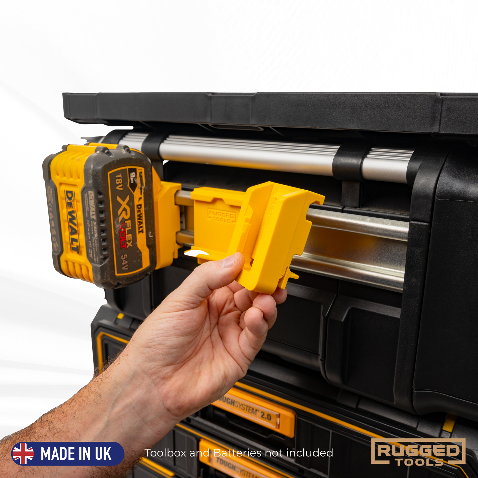 Two Rugged Tools yellow R-Clips installed side-by-side holding DeWalt batteries